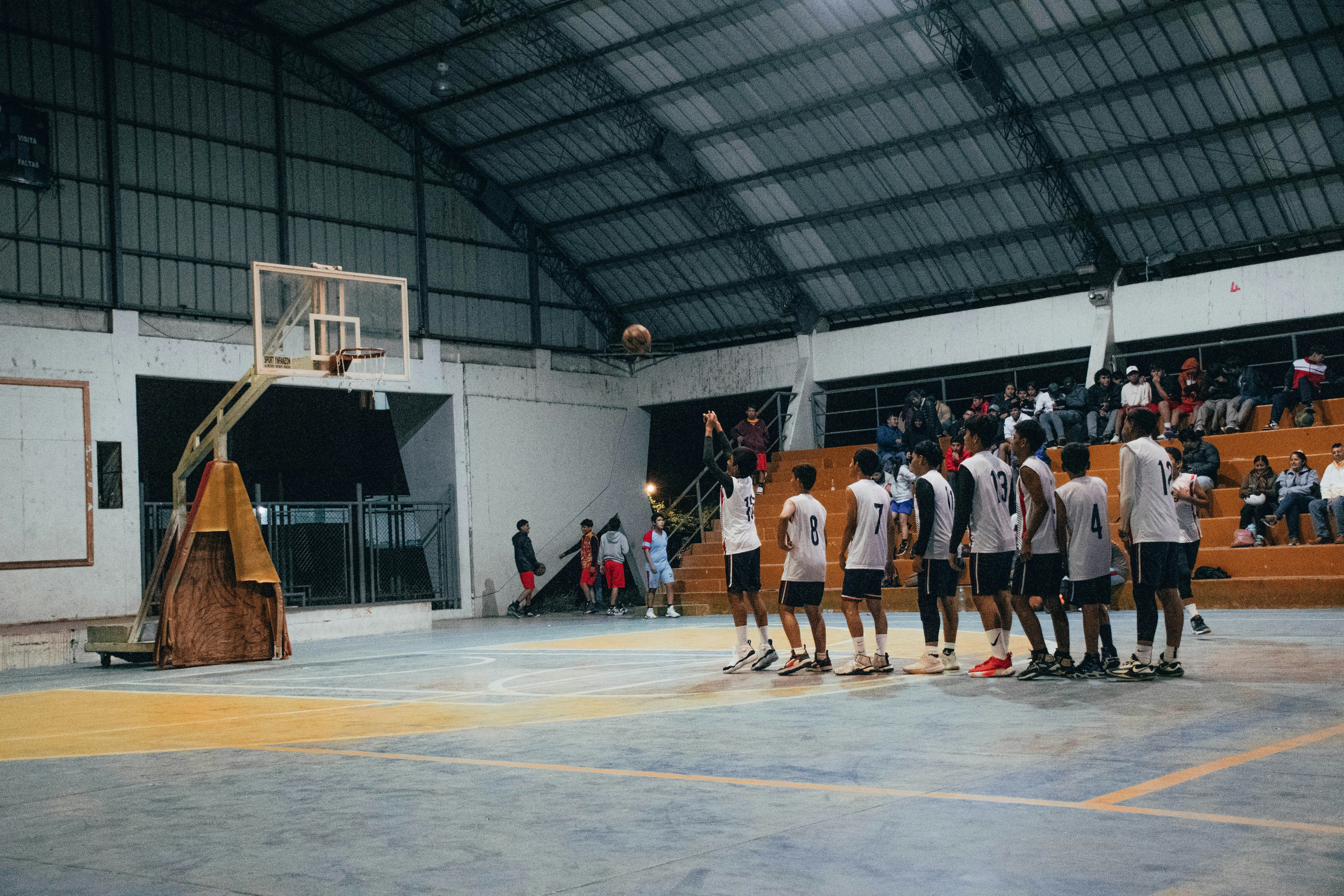 Player receiving form coaching while shooting
